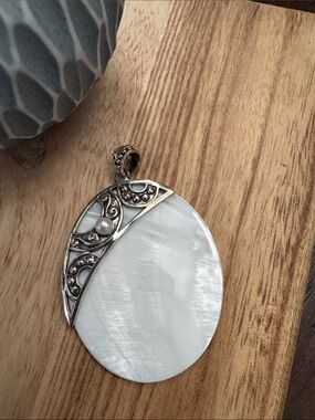 NWOT White Mother of Pearl Oval Pendant with Sterling Silver Accent